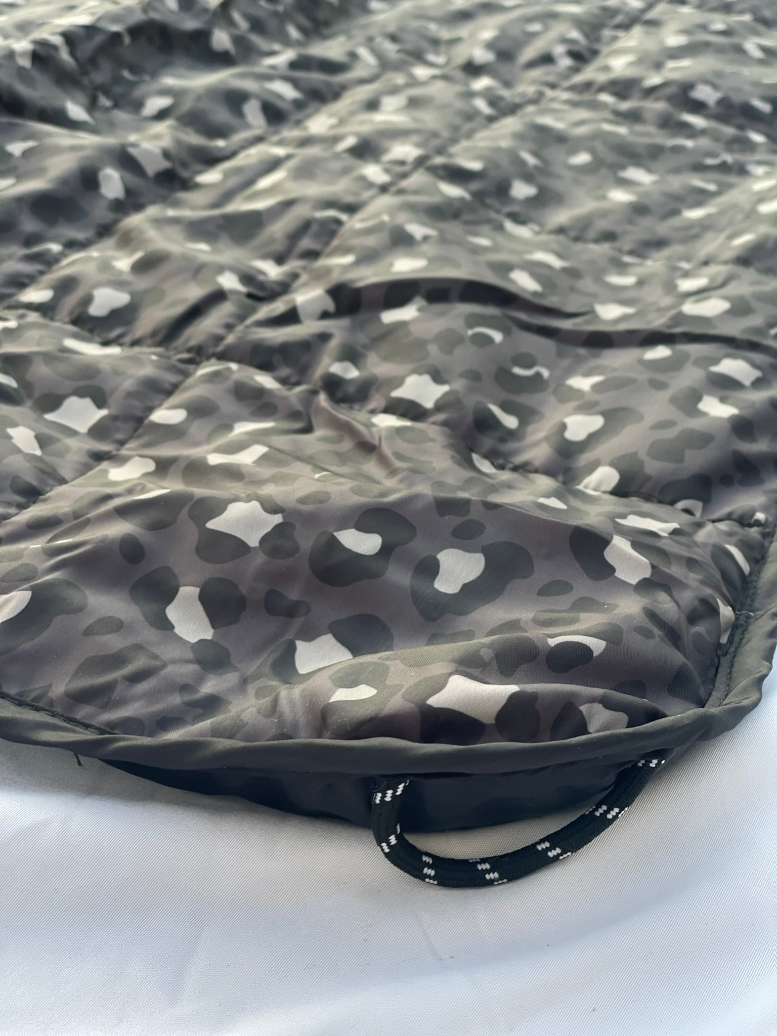 Introducing the Seven Sisters Sammie Snug Weighted Blanket - the perfect companion for outdoor activities like camping, picnics, and kids' sporting events. This waterproof and weighted blanket provides comfort and relaxation wherever you go. With its versatile design, it can also be used as a regular blanket for everyday use. Stay cozy and snug with the Seven Sisters Sammie Snug Weighted Blanket.