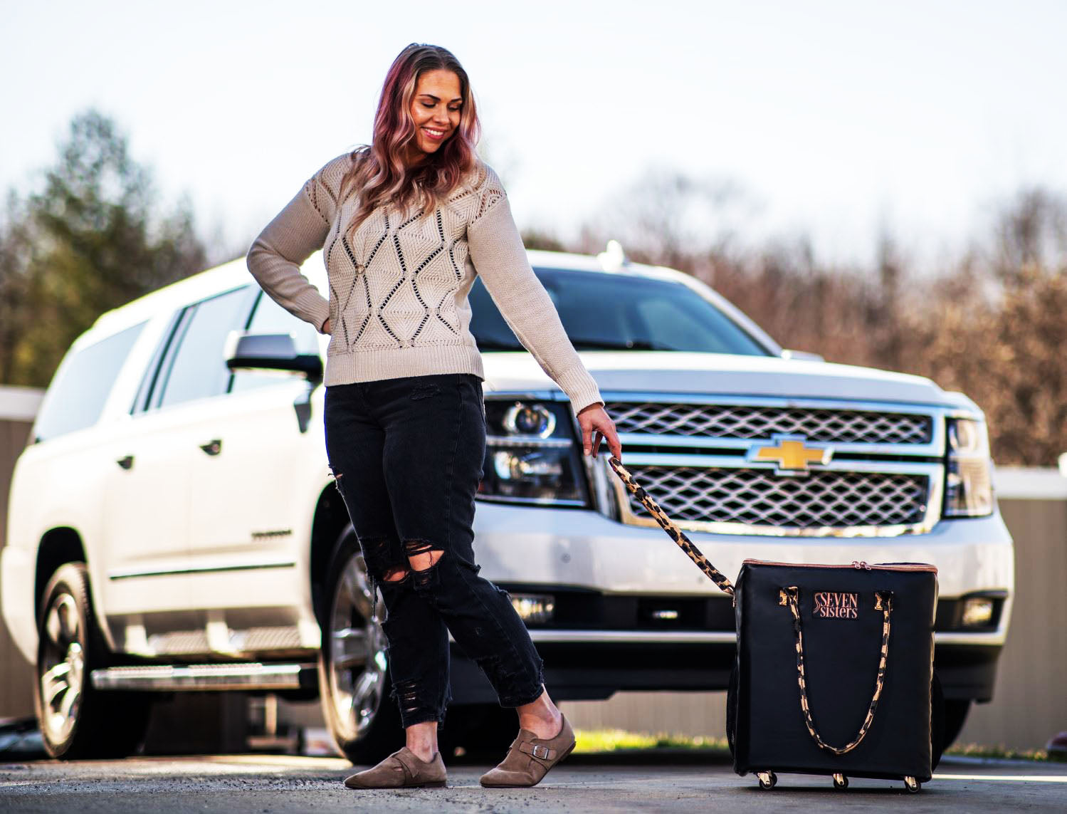 Ellie, the Rolling Tote by Seven Sisters is the ultimate companion for busy women on the go. With its stylish design and convenient wheels, this tote is perfect for shopping, pool days, or any other activity that requires you to be on the move. Stay organized and stylish with Ellie, the Rolling Tote by Seven Sisters.
