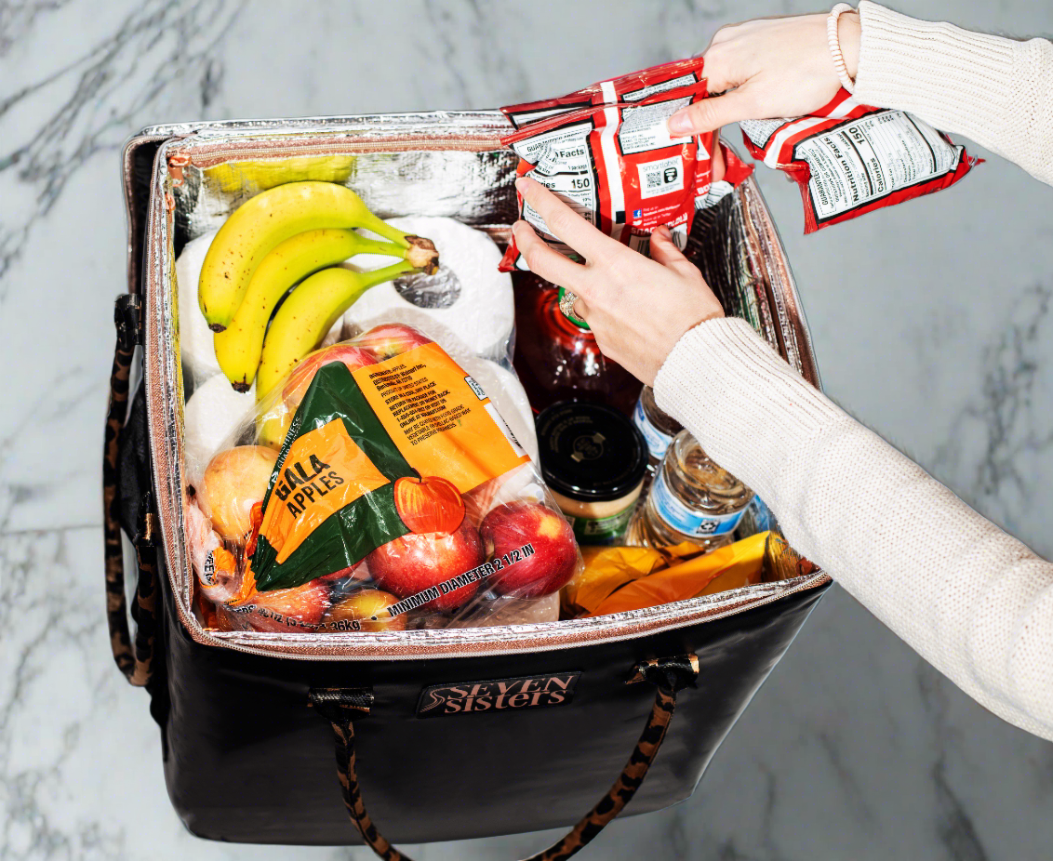 Ellie, the Rolling Tote by Seven Sisters is the ultimate companion for busy women on the go. With its stylish design and convenient wheels, this tote is perfect for shopping, pool days, or any other activity that requires you to be on the move. Stay organized and stylish with Ellie, the Rolling Tote by Seven Sisters.